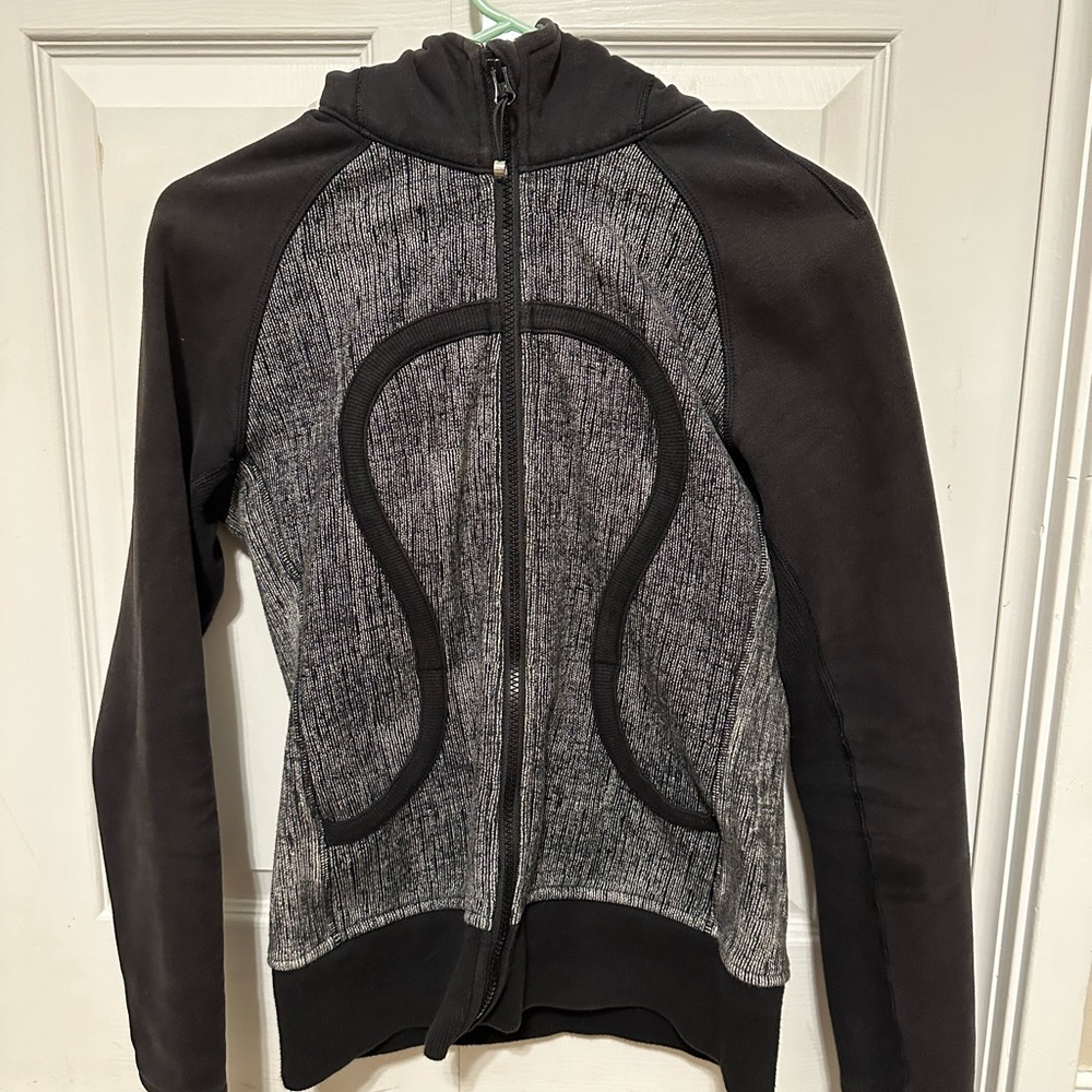 Black and grey full zip Lululemon hoodie with pockets